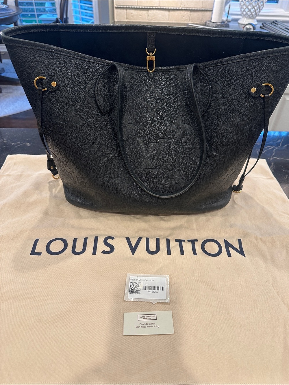 Louis Vuitton Neverfull MM in embossed Monogram Empreinte leather